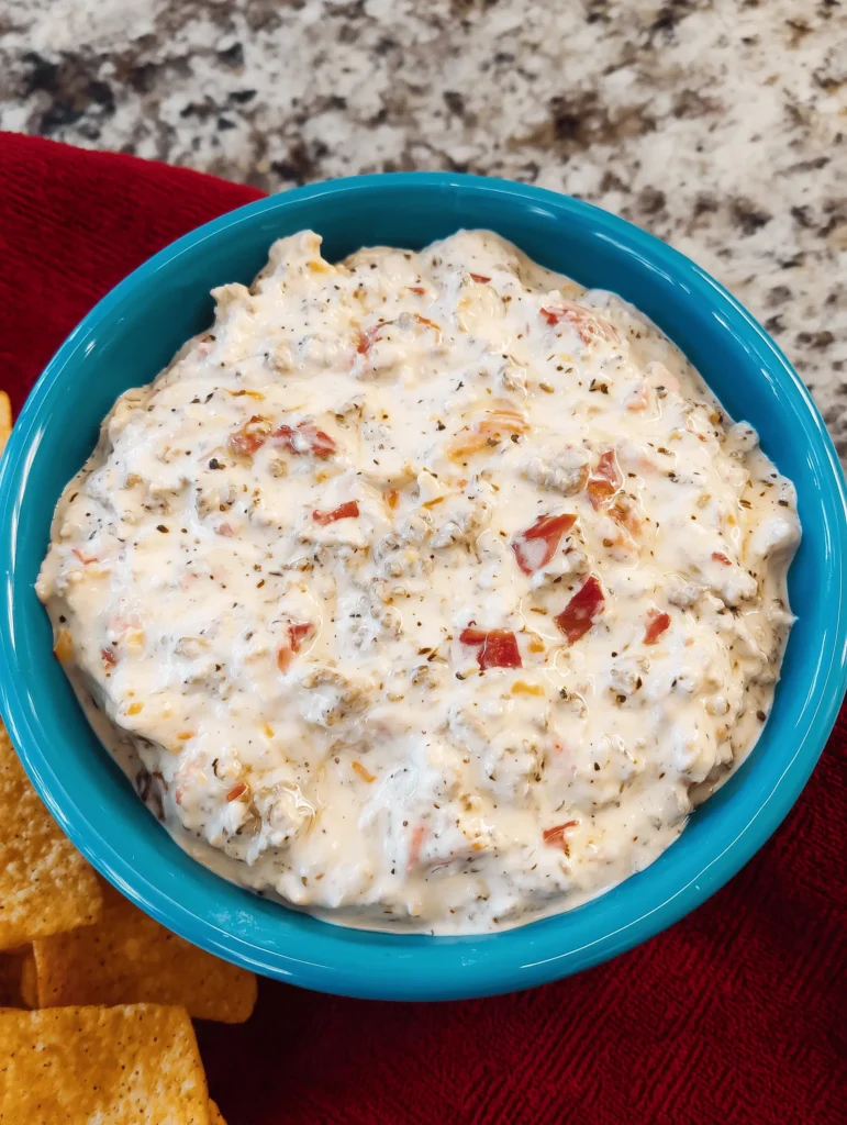 This creamy, crowd-pleasing sausage dip is perfect for parties and gatherings, featuring a delightful blend of sausage, cream cheese, and Rotel tomatoes.