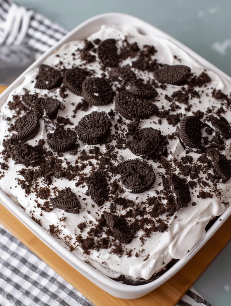 Delicious homemade Oreo Ice Cream Cake with layers of cookies and cream, perfect for summer.