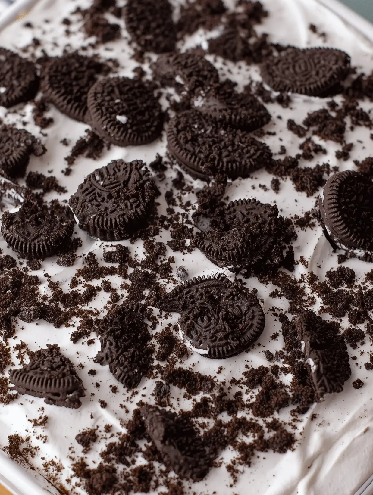 Delicious homemade Oreo Ice Cream Cake with layers of cookies and cream, perfect for summer.